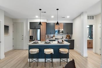Gourmet prep island with pendant lighting*